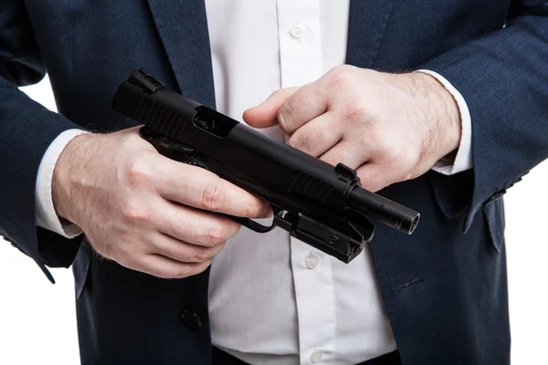 Uomo con una pistola in mano — Foto Stock