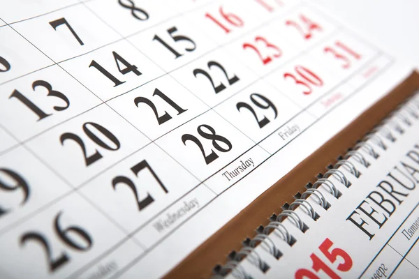 Wall calendars laid on the table — Stock Photo, Image