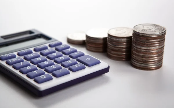 Handful of Russian rubles with calculator — Stock Photo, Image