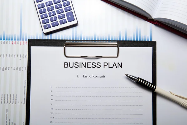 Negócios ainda vida com plano de negócios — Fotografia de Stock