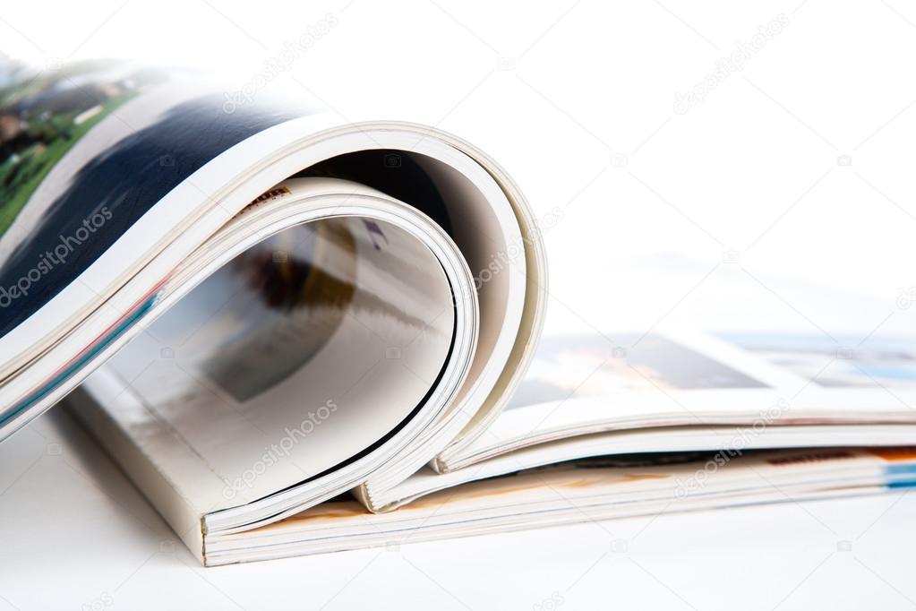 stack of magazines on a white background