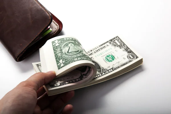 Ruce drží bankovku — Stock fotografie