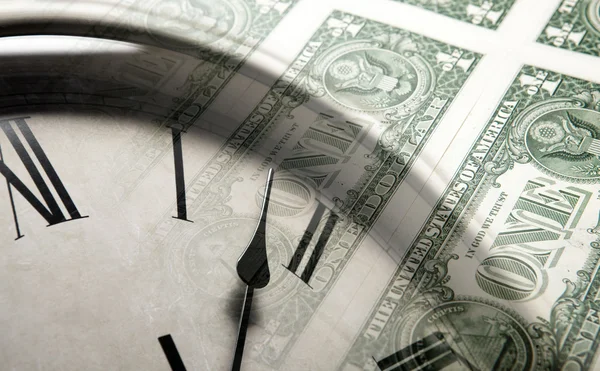 Kağıt arka plan üzerinde dolar saat