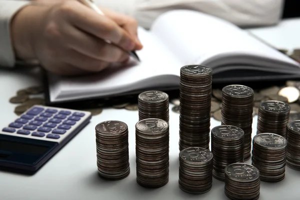 Stack of Russian coins on the background of working as an accoun — Stock Photo, Image