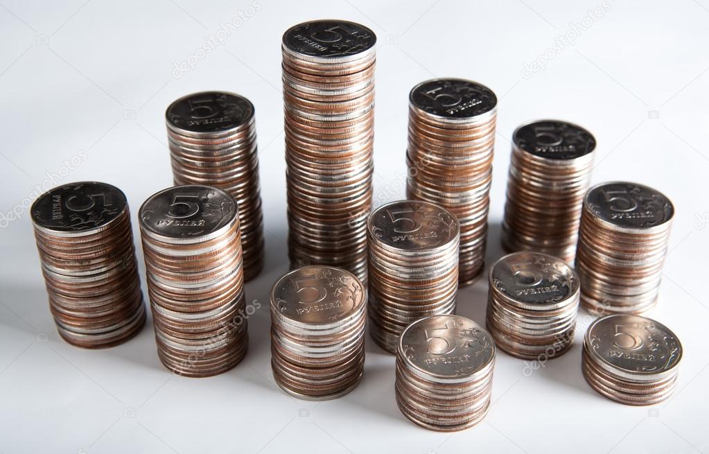 plurality of stacks of five-ruble coins