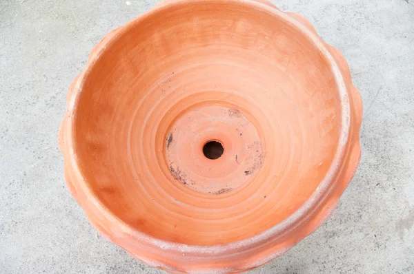 Clay pot isolated on Cement flooring — Stock Photo, Image