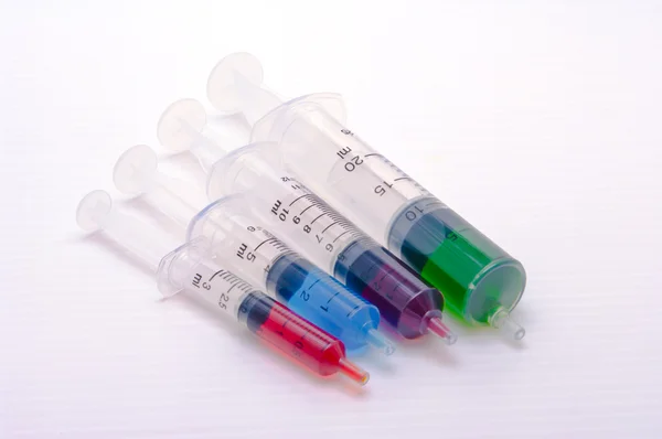 Vaccine in syringes on white backgroun — Stock Photo, Image