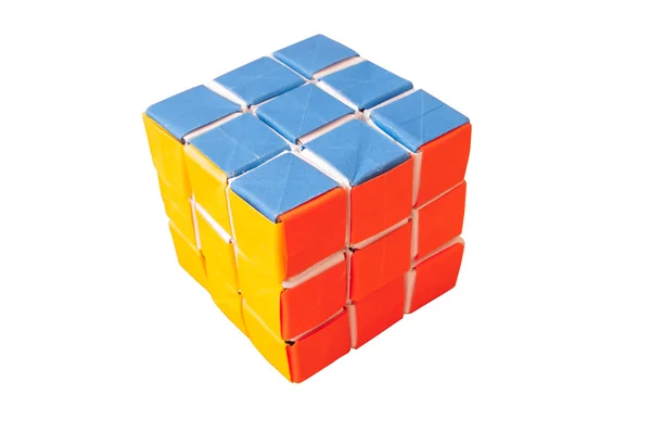 Rubik cube en papier en fond bois — Photo