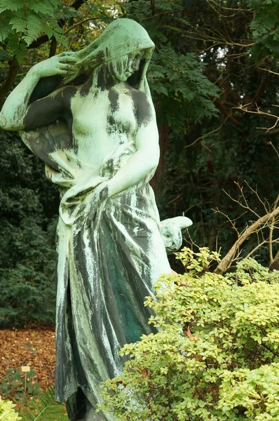 Statue of goddess with an owl — Stock Photo, Image