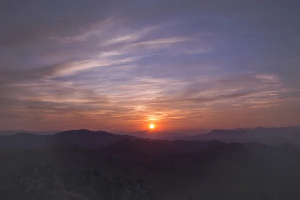 Colorful sunset on top of thailand mountain — Stock Photo, Image