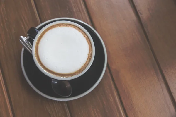Xícara de café vista superior em madeira velha. Vindima — Fotografia de Stock