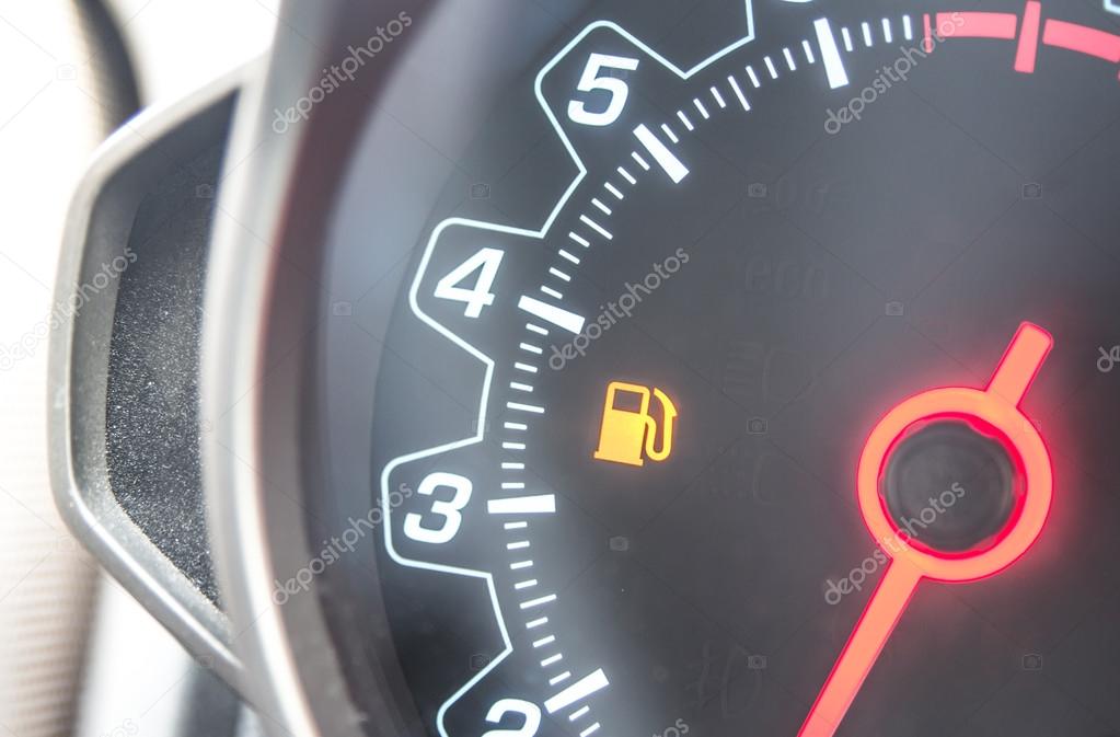 Out Of Gas - A car's gas tank is nearly empty.