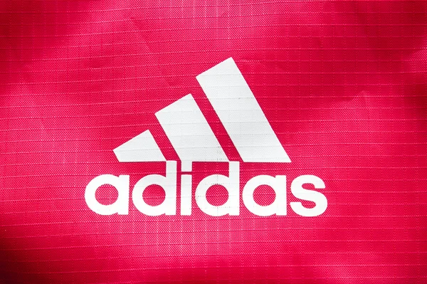 October 2014 - BERLIN: the logo of the brand cloth bags "Adidas" — Stock Photo, Image