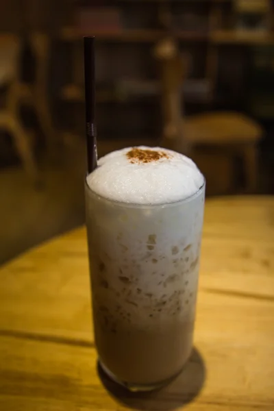 Ice coffee on the wood desk — Stock Photo, Image