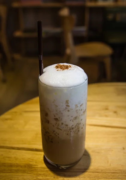 Ice coffee on the wood desk — Stock Photo, Image