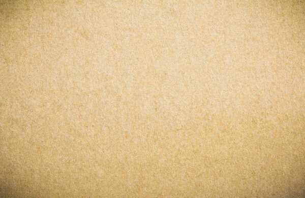 Текстура бумаги - лист бумаги коричневого цвета.