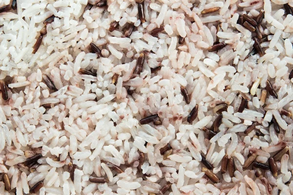 Brown rice background — Stock Photo, Image