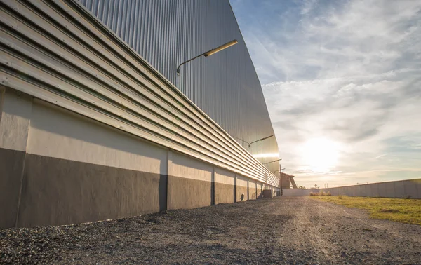 Behind the warehouse evening — Stock Photo, Image