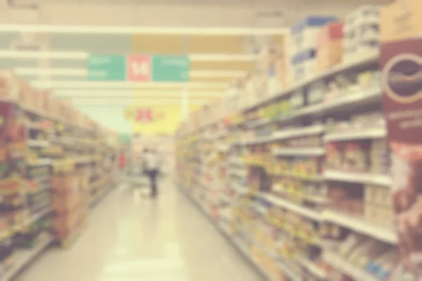 Supermarkets, lens blur effect. Vintage filter.