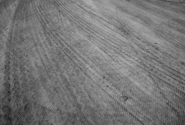 Lastik izleri ile soyut yol arka plan.