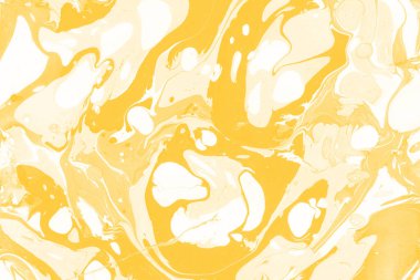 Sarı mermer arkaplan boya sıçrama deseni ile