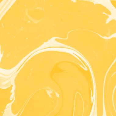 Sarı mermer arkaplan boya sıçrama deseni ile