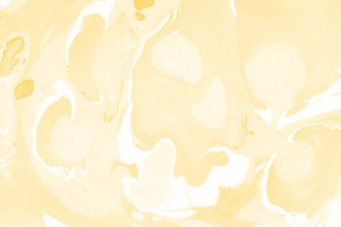 Sarı mermer arkaplan boya sıçrama deseni ile