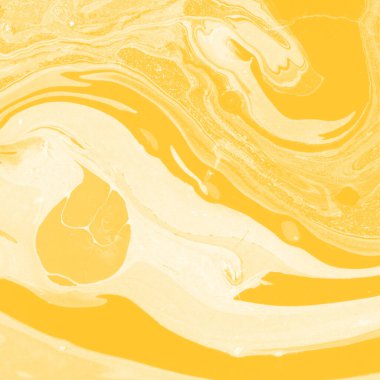 Sarı mermer arkaplan boya sıçrama deseni ile