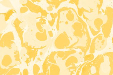 Sarı mermer arkaplan boya sıçrama deseni ile