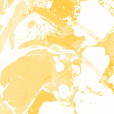 Sarı mermer arkaplan boya sıçrama deseni ile