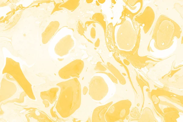 Sarı mermer arkaplan boya sıçrama deseni ile
