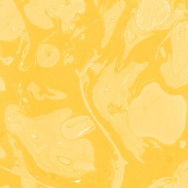 Sarı mermer arkaplan boya sıçrama deseni ile