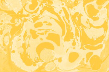 Sarı mermer arkaplan boya sıçrama deseni ile