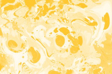 Sarı mermer arkaplan boya sıçrama deseni ile