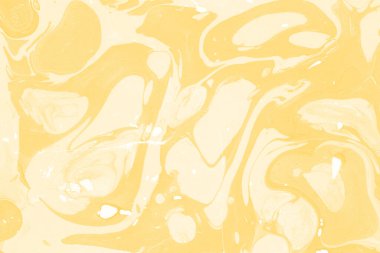Sarı mermer arkaplan boya sıçrama deseni ile