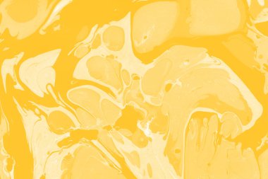 Sarı mermer arkaplan boya sıçrama deseni ile