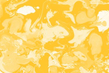 Sarı mermer arkaplan boya sıçrama deseni ile
