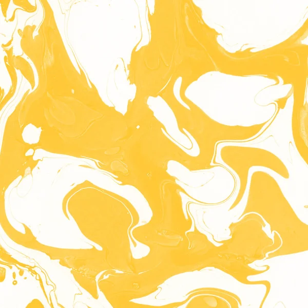 Sarı mermer arkaplan boya sıçrama deseni ile