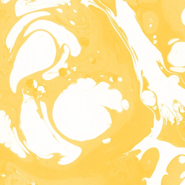 Sarı mermer arkaplan boya sıçrama deseni ile