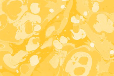 Sarı mermer arkaplan boya sıçrama deseni ile