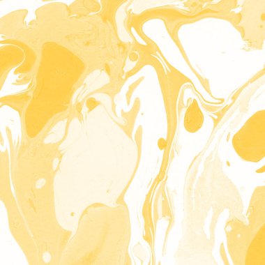 Sarı mermer arkaplan boya sıçrama deseni ile