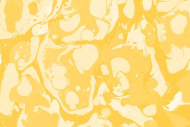 Sarı mermer arkaplan boya sıçrama deseni ile