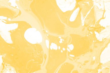 Sarı mermer arkaplan boya sıçrama deseni ile