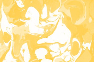 Sarı mermer arkaplan boya sıçrama deseni ile