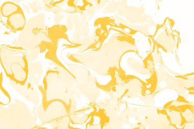 Sarı mermer arkaplan boya sıçrama deseni ile