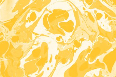 Sarı mermer arkaplan boya sıçrama deseni ile
