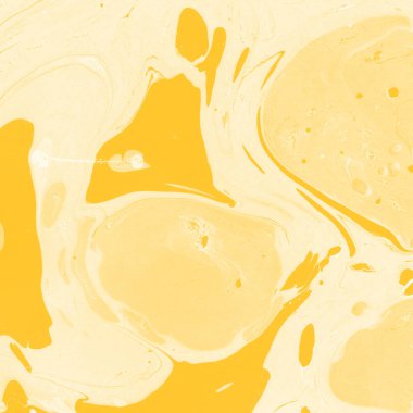 Sarı mermer arkaplan boya sıçrama deseni ile