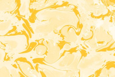 Sarı mermer arkaplan boya sıçrama deseni ile