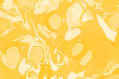 Sarı mermer arkaplan boya sıçrama deseni ile