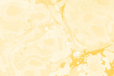 Sarı mermer arkaplan boya sıçrama deseni ile